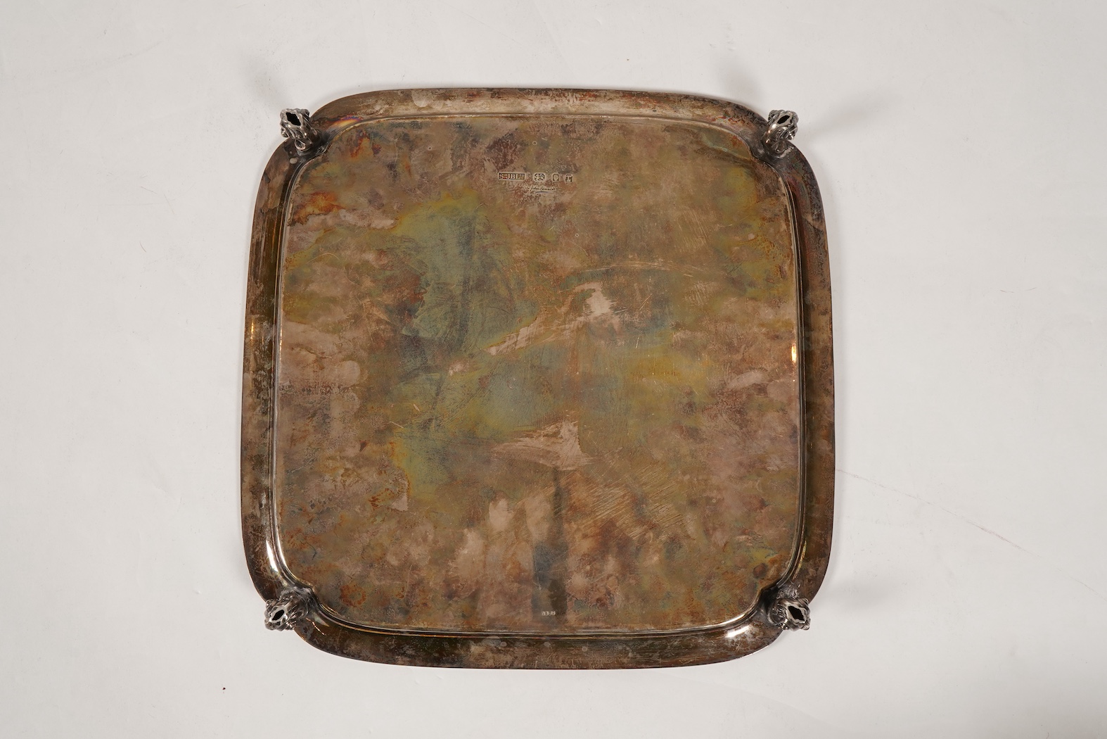 A George V silver salver by Sir John Bennett Ltd